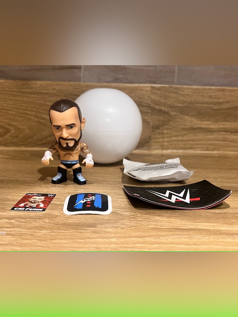 Zuru. Suprise Ballers - WWE CM Punk Mini Figure with Blue & Black Ring Gear